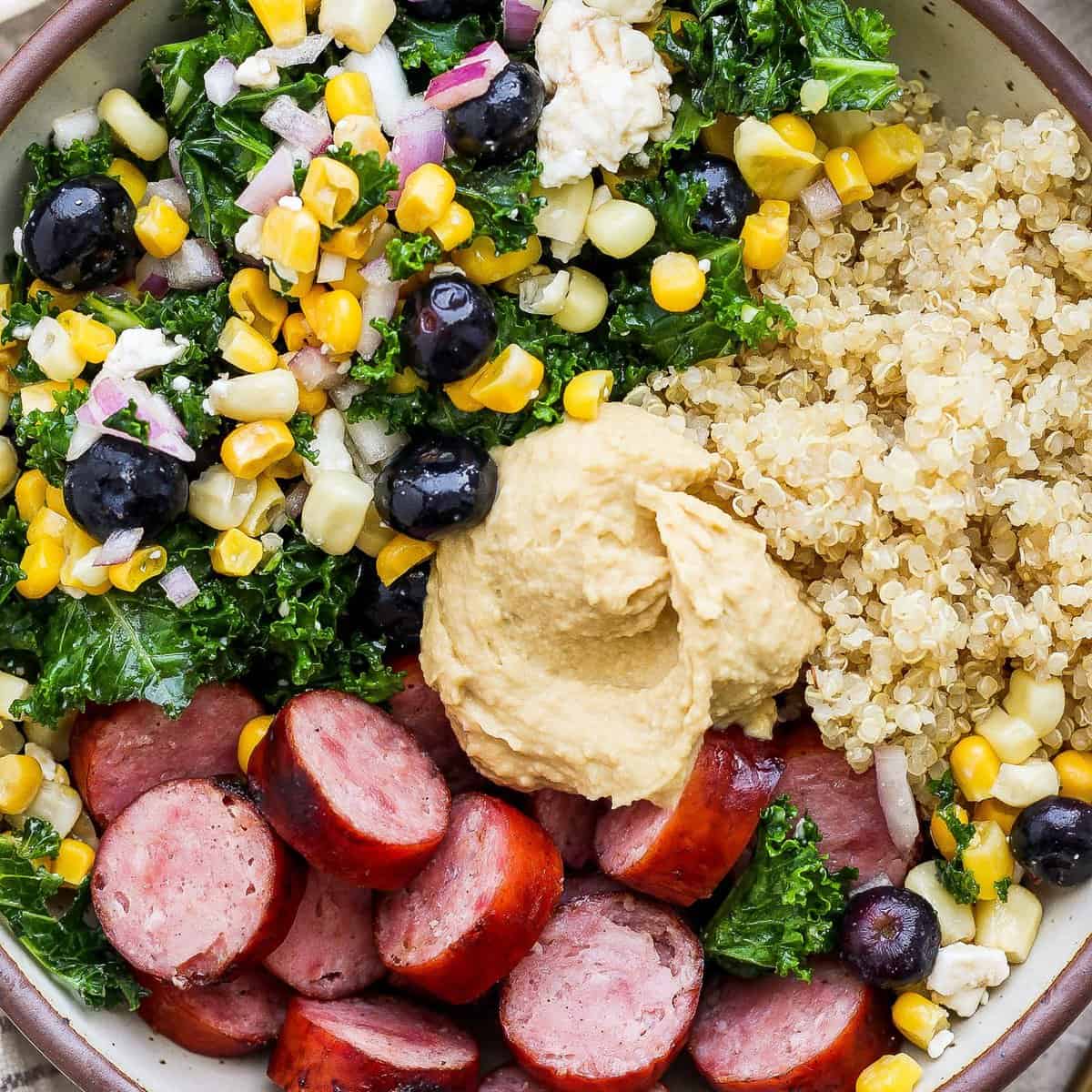 Unpacking the Hodgepodge Protein Bowl: Brats, Quinoa, & Kale